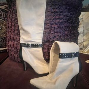 Chic Beige Knee-High Boots with Black Accents